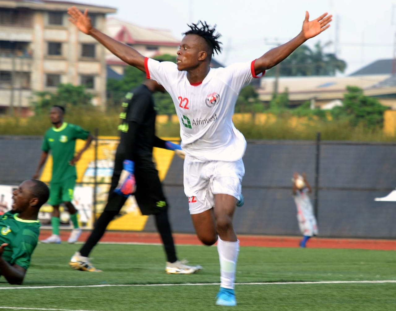 Isaac Saviour celebrates scoring for Enugu Rangers in the NPFL against Kano Pillars