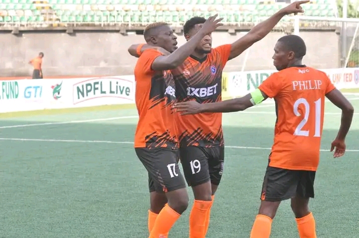 Akwa United players celebrate a goal