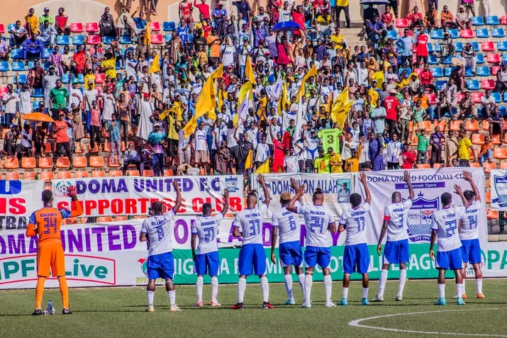 Doma United players appreciating their fans after an NPFL game