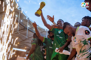 Kenneth Omeruo lifts the trophy