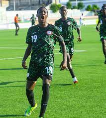 Arieri Kparobo celebrates a goal for Nigeria