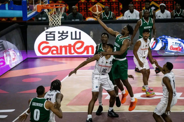 Caleb Agada Helps Nigeria Overcome Madagascar In D’Tigers First Afrobasket Game Akobundun in action at Afrobasket for D'Tigers