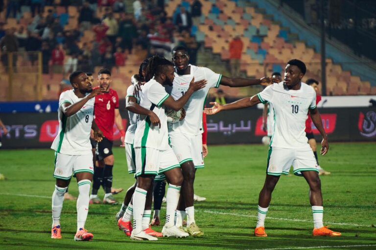 Onuachu celebrates with Awaziem