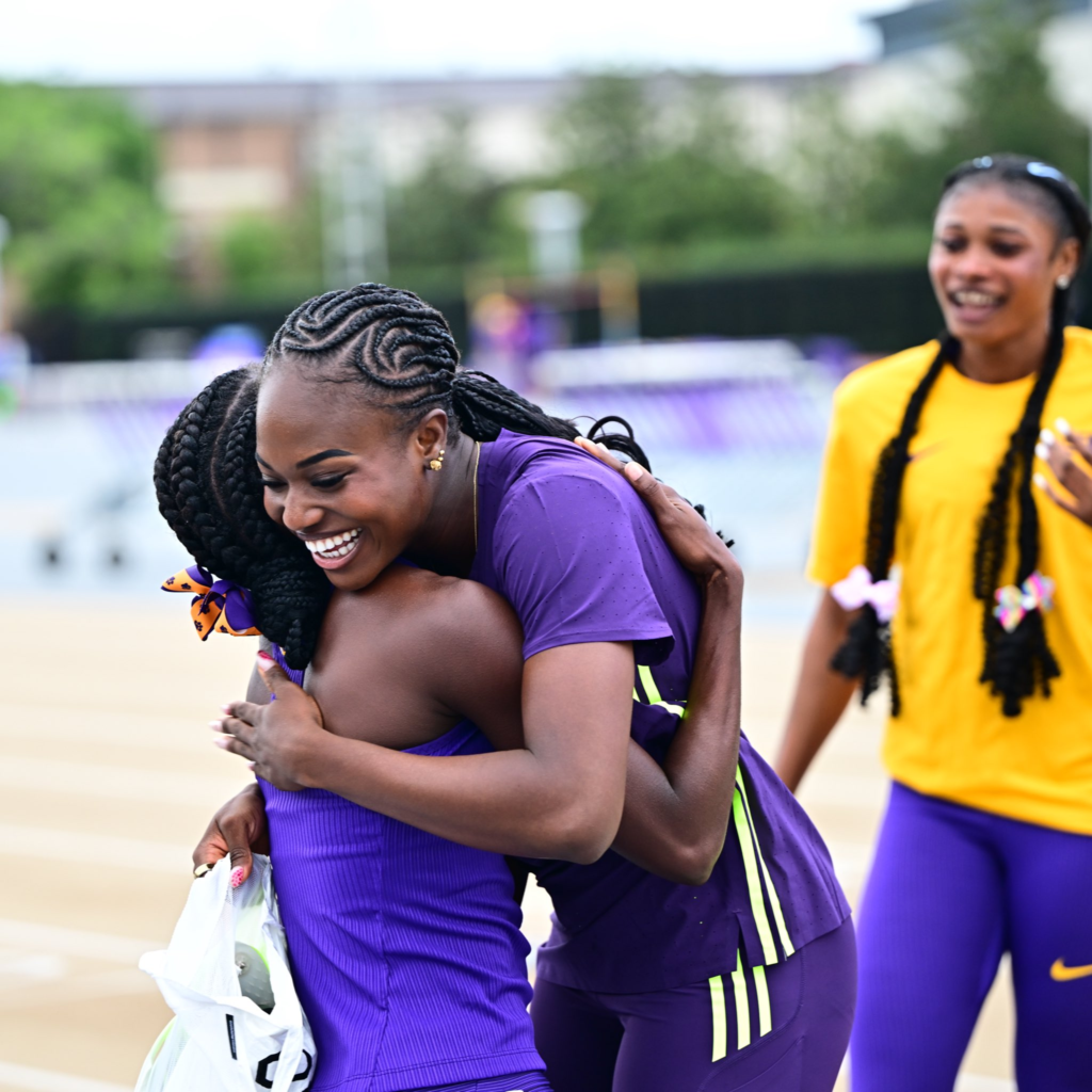 Ella and Favour Ofili share a hug
